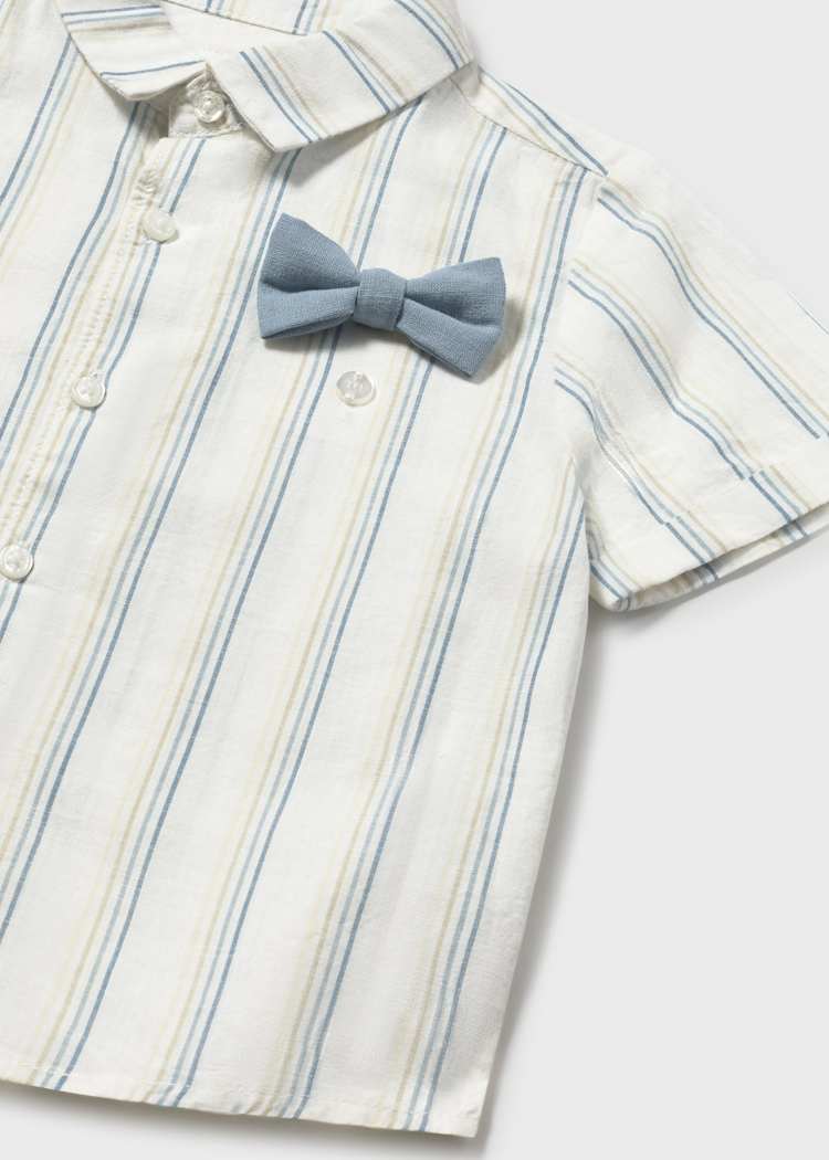 White and blue striped shirt with a gray bow tie on a light gray background