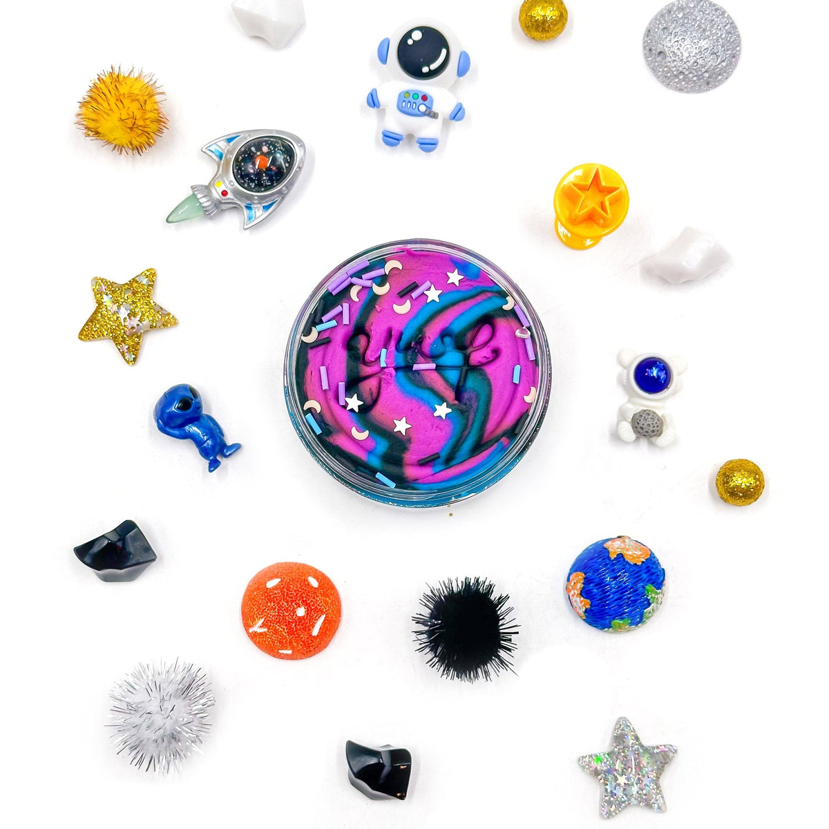 Colorful fidget spinner with various small decorative items on a white background