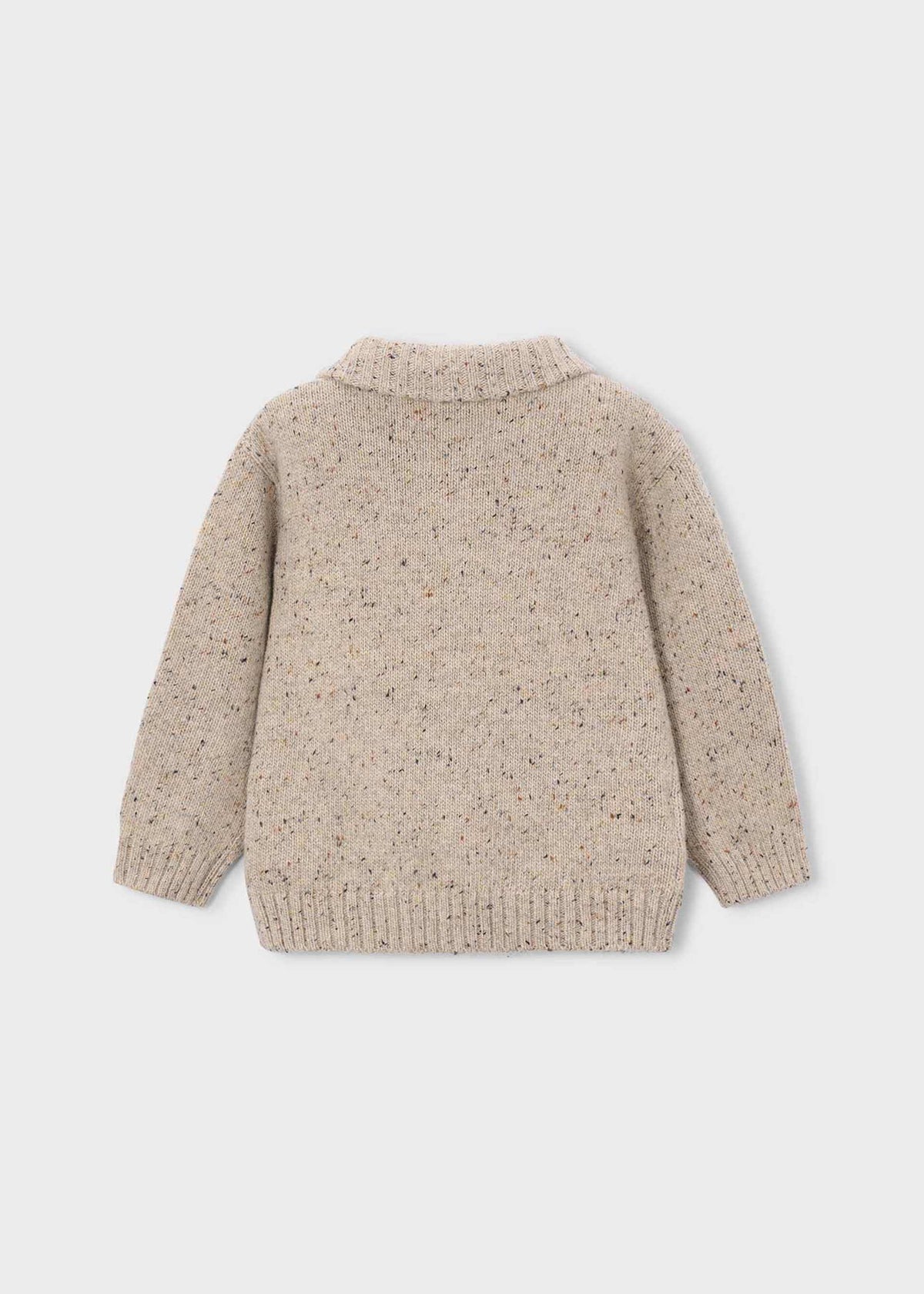 Beige knitted cardigan on a light gray background