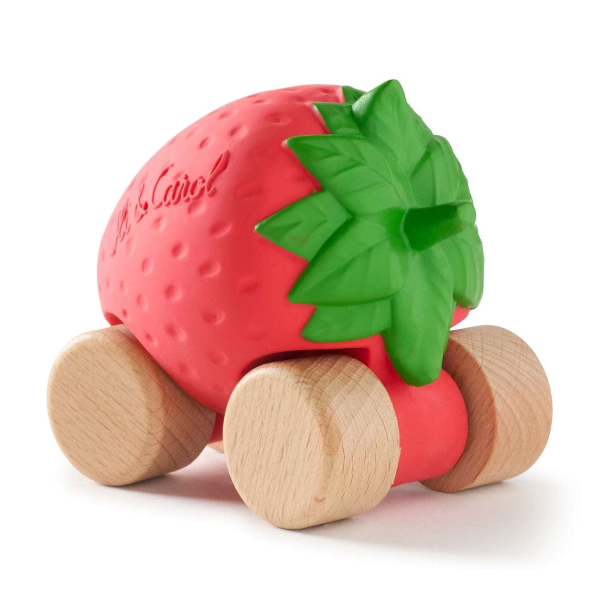 A strawberry-shaped wooden toy car with a textured red body, a green leafy top, and natural wood wheels against a white background.