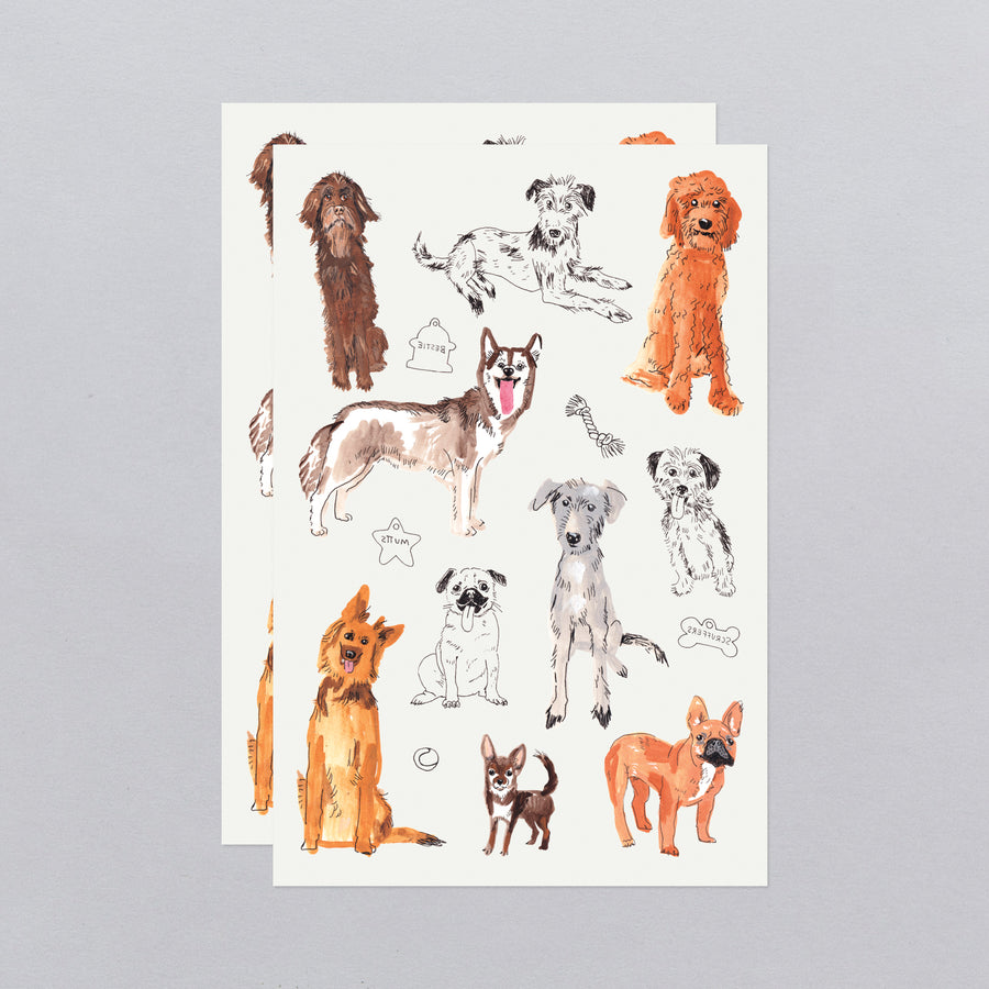 Two sheets of dog-themed temporary tattoos on a gray background