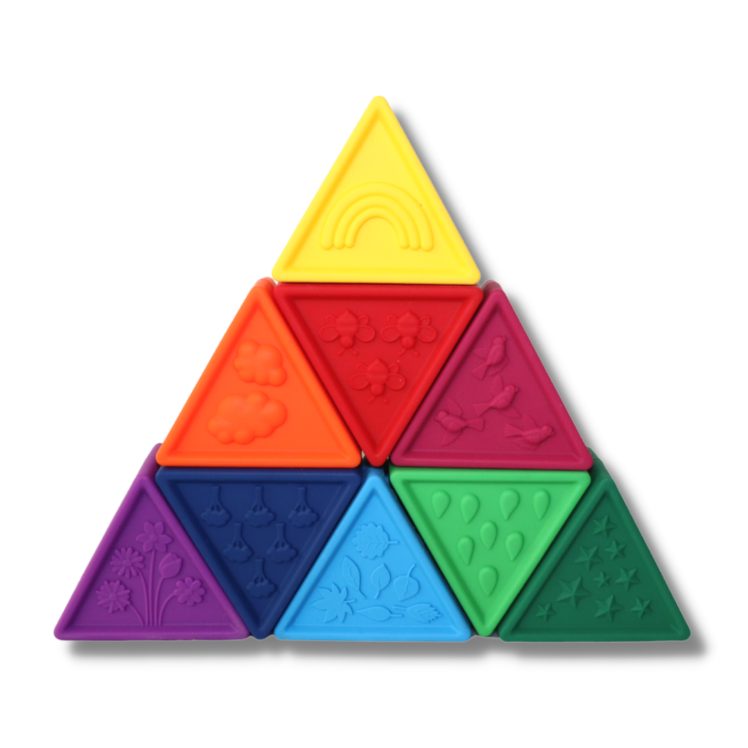 Set of colorful triangular tiles with various patterns on a white background