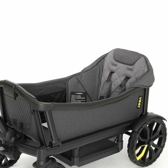 Gray baby car seat with wheels on a white background