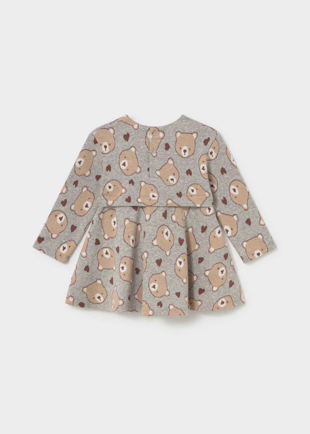 A toddler's long-sleeve peplum dress in heather gray fabric, featuring an all-over print of teddy bears and small hearts in beige and brown, shown against a light gray background.