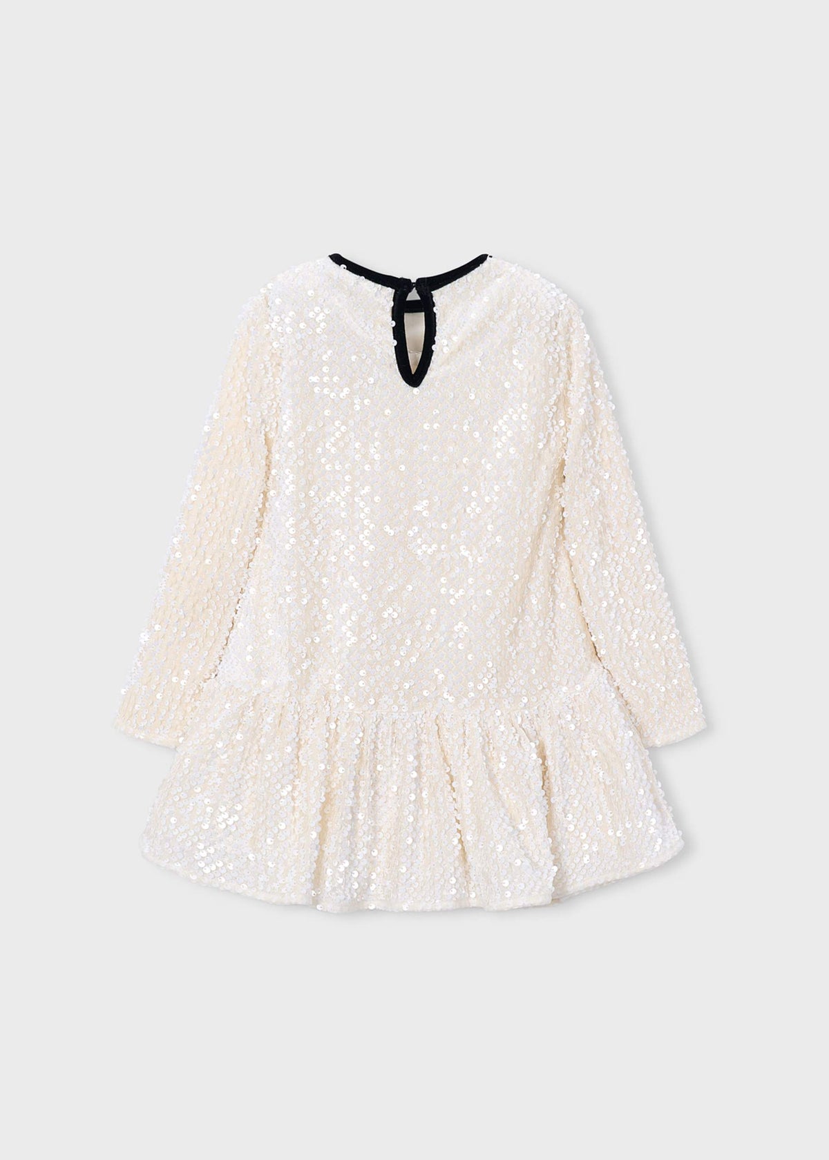 A long-sleeve, off-white sequined dress with a ruffled hem and a black neck tie, shown against a light gray background.