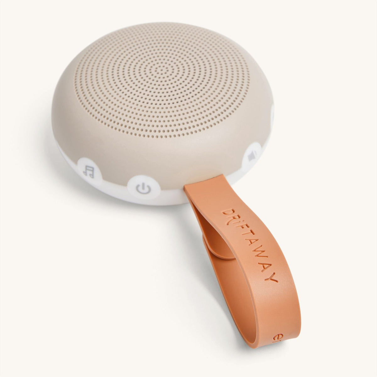 Beige portable speaker with an orange handle on a white background