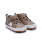 A pair of toddler's mid-top sneakers in taupe brown, featuring faux leather panels, hook-and-loop straps, a white star on the side, a white rubber toe cap, and a light blue heel tab.