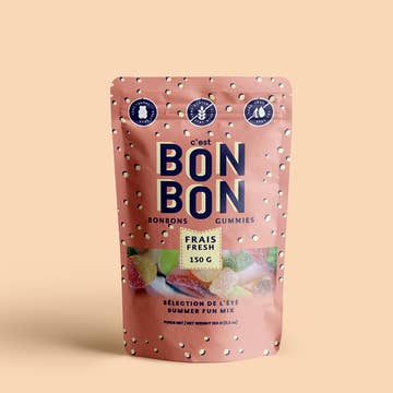 Pink packaging of 'c'est Bon Bon' gummies on a beige background