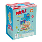 A colorful Floss & Rock construction-themed 60-piece shaped jigsaw puzzle box with a blue and red striped top, carrying handle, and illustrations of a crane, construction worker, and bricks.