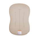 A beige contoured seat cushion or support pad with molded ergonomic curves, shown from the back on a clean white background.