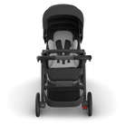 Black and gray stroller on a white background