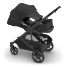 Black stroller on a white background