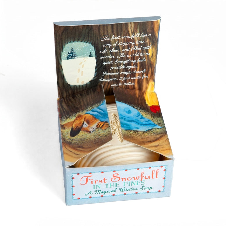 Product packaging with illustrations of a snowy landscape and text on a white background
