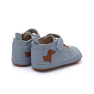 Pair of blue children's shoes with a dachshund design on a white background