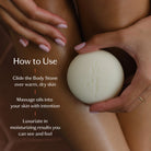 Person holding a white body stone with text on how to use it.