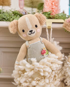 A teddy bear on a Christmas decorations.
