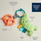 Sensory travel toy with features highlighted on a beige background