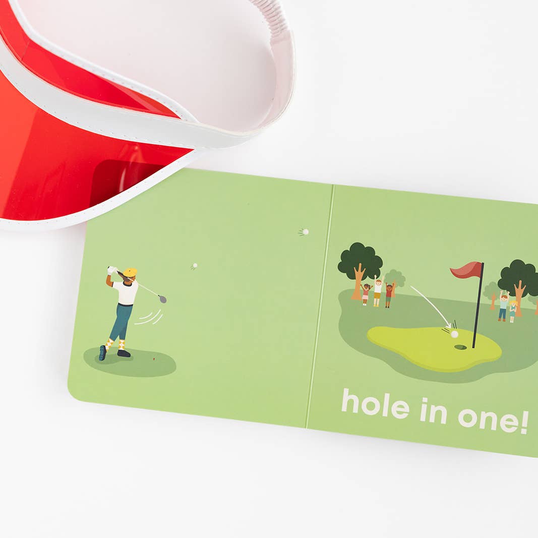 Children's book with a golf-themed illustration and 'hole in one!' text on a white background.