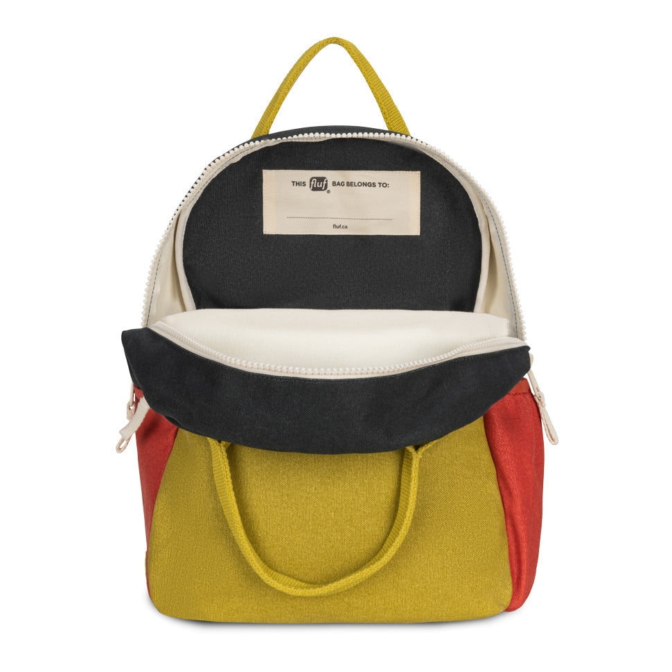 Colorful backpack with open front pocket on a white background
