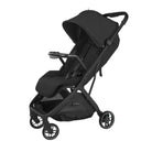 An UPPAbaby Minu V3 stroller in black, shown from a three-quarter angle against a white background with an attached snack tray on the front.
