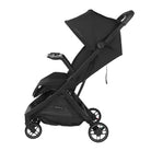 An UPPAbaby Minu V3 stroller in black, shown from a side profile against a plain white background with an attached snack tray on the front.