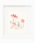A framed children's art print featuring a cute illustration of a little girl in blue overalls standing among red and orange mushrooms and small flowers, presented in a white frame against a white background.