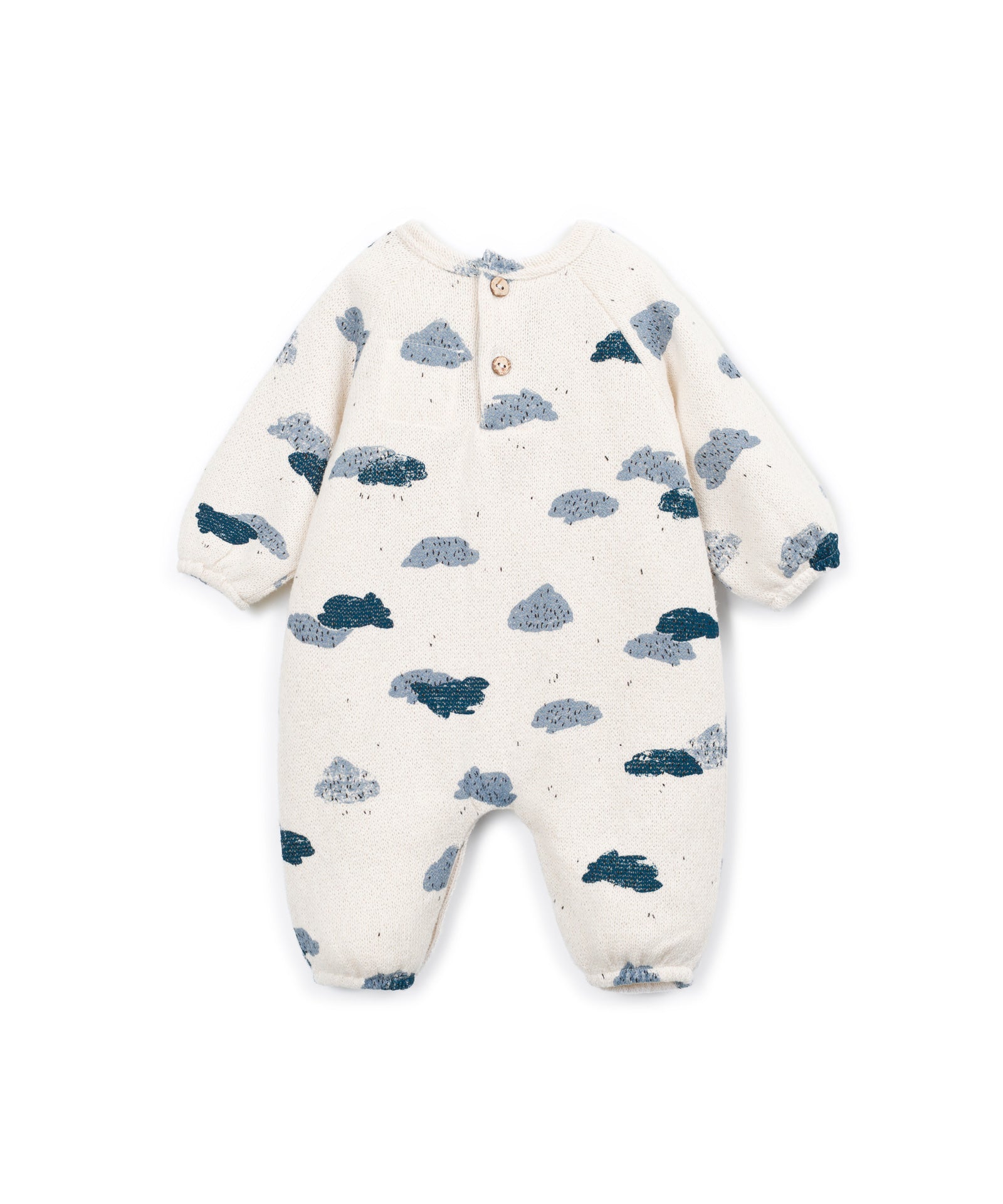 A baby long-sleeve footless one-piece romper in cream with a scattered cloud pattern in navy and slate blue, featuring a snap-button henley neckline.