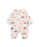 A baby long-sleeve footless one-piece romper in cream-colored fabric with a scattered pink and dusty rose cloud pattern, featuring a three-button snap closure at the collar.