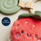 Teething toy with soft silicone design on a light background