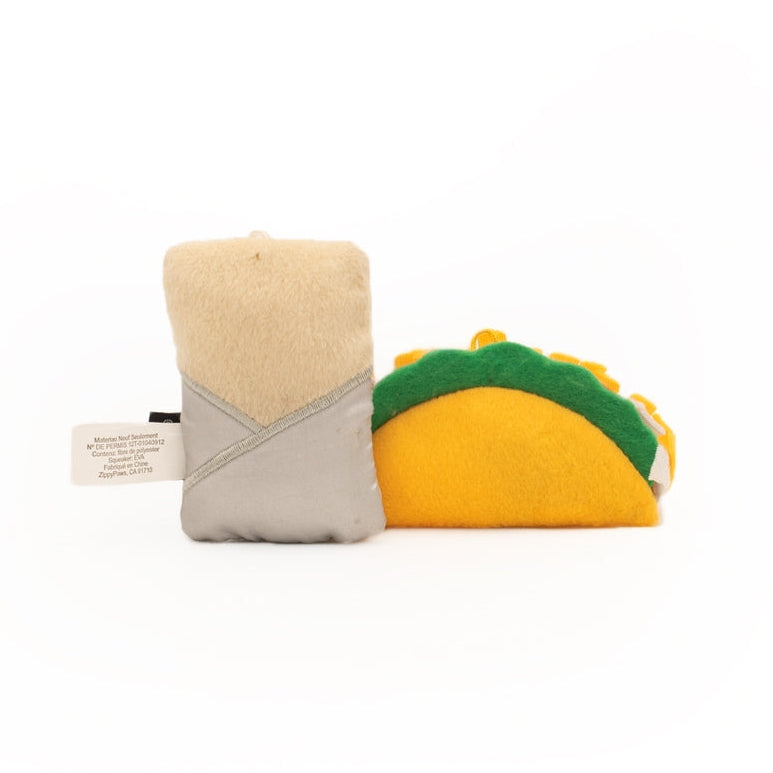 A small felt taco-shaped pouch or accessory with a beige top, gray side panel, yellow lower half, and green top edge, shown on a plain white background.