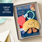 Itzy Ritzy Itzy Pal plush toy with teether in packaging on a light background