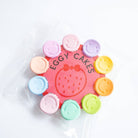 Colorful plastic cake mold with 'Eggy Cakes' branding on a white background