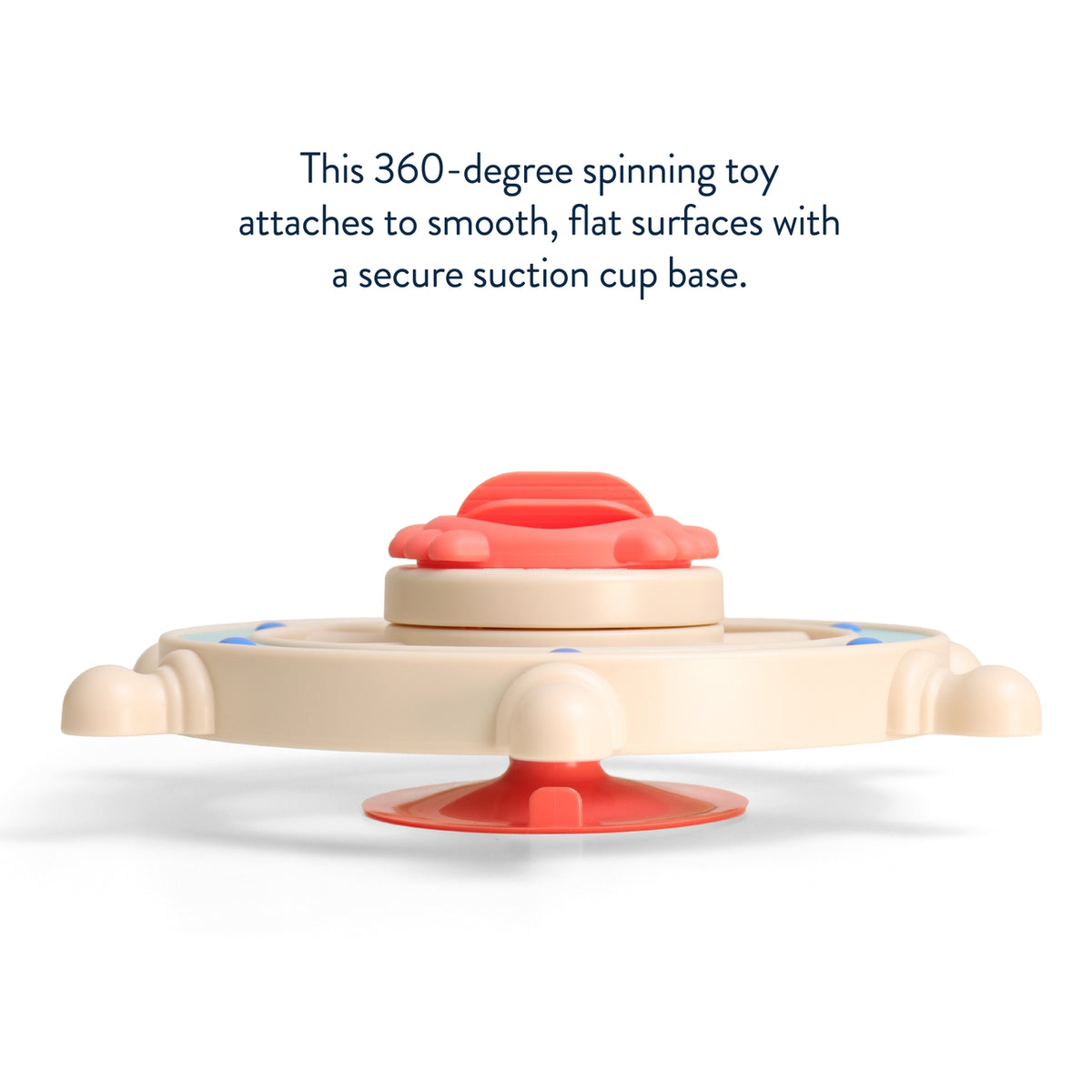 360-degree spinning toy with red top and beige base on a white background