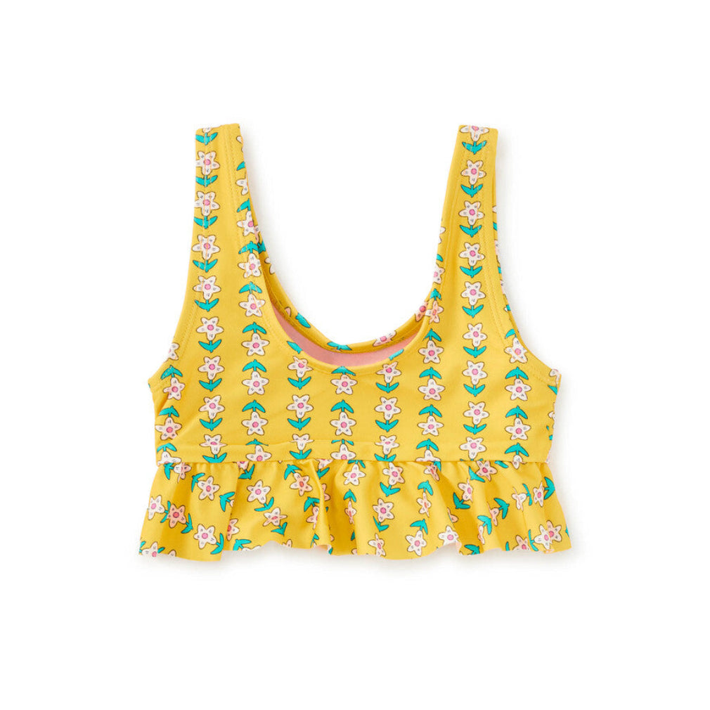 A yellow sleeveless crop top with a ruffled hem, featuring an all-over print of pink flowers with green leaves, shown on a plain white background.