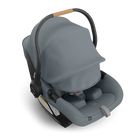 Gray baby car seat with canopy on a white background