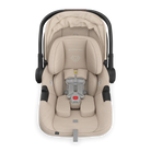 Beige baby car seat with black frame on a white background