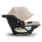 Baby car seat with canopy on a white background