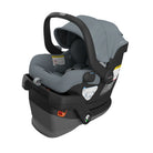 A Hypoallergenic Maxi-Cosi safety car seat in a side-impact configuration, featuring a slate gray fabric interior and a black base with a dark gray handlebar, shown on a solid white background.