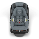 Gray car seat with visible branding on a white background