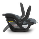 Black and gray baby car seat with 'MESA' branding on a white background