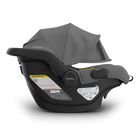 Baby car seat with canopy on a white background