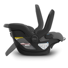 Black baby car seat with gray headrest on a white background