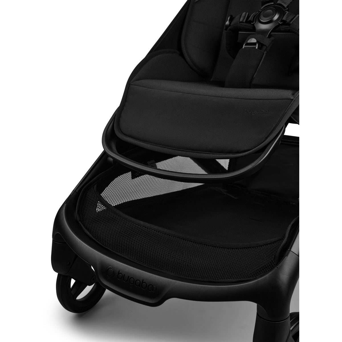 Black stroller seat with visible brand logo on a white background