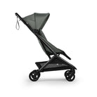 Black stroller with a gray canopy on a white background