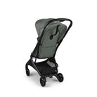 Green baby stroller with black frame on a white background
