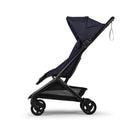 Black stroller with navy blue canopy on a white background