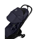 Navy blue stroller with black accents on a white background
