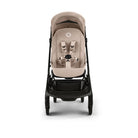 Beige baby stroller on a white background