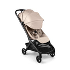 Beige and black stroller on a white background