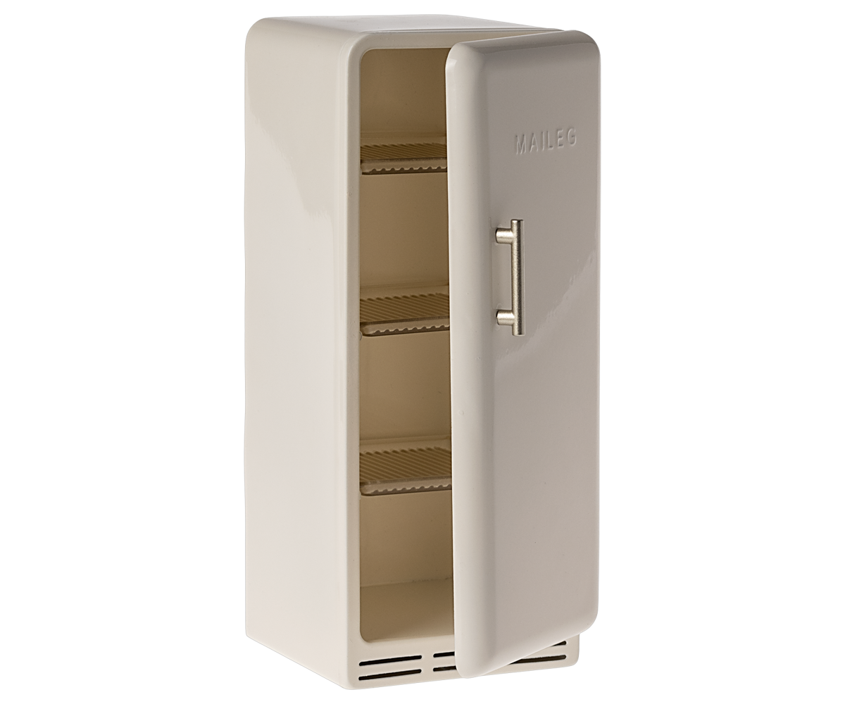 Beige refrigerator with a metallic handle on a white background